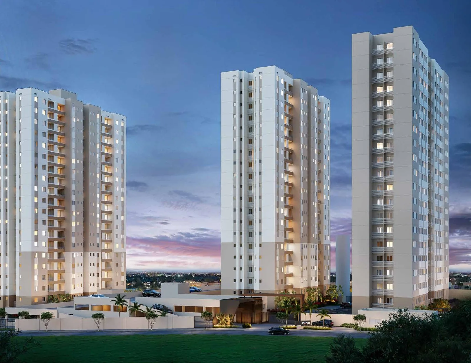 Fachada do Inove Residence, com as três torres iluminadas ao entardecer