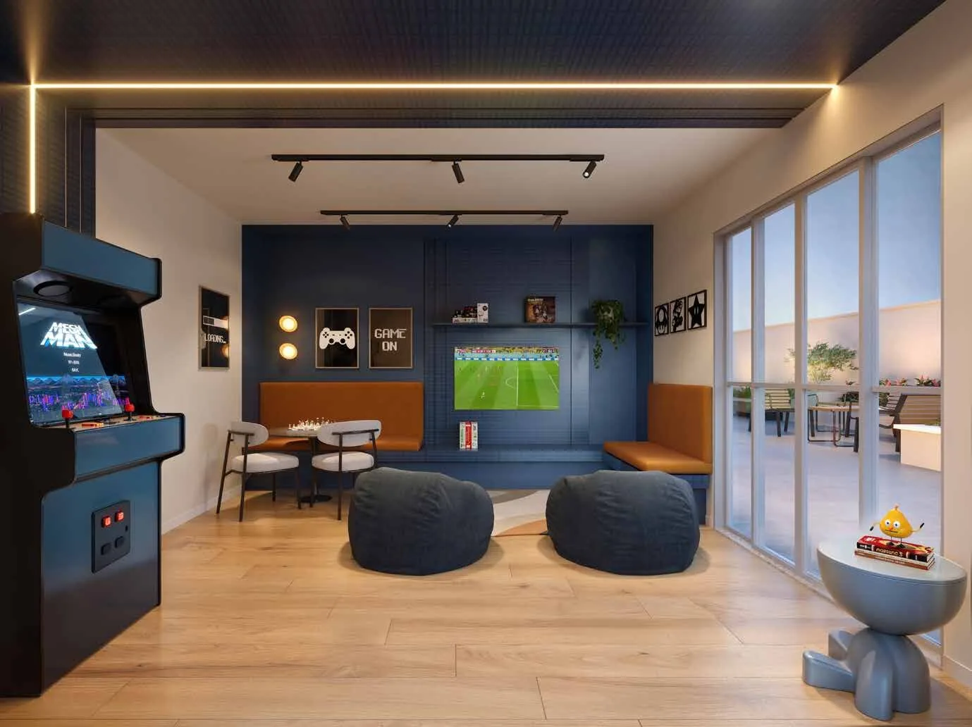 Sala de jogos do Inove Residence, com fliperama, mesa de jogos e televisão