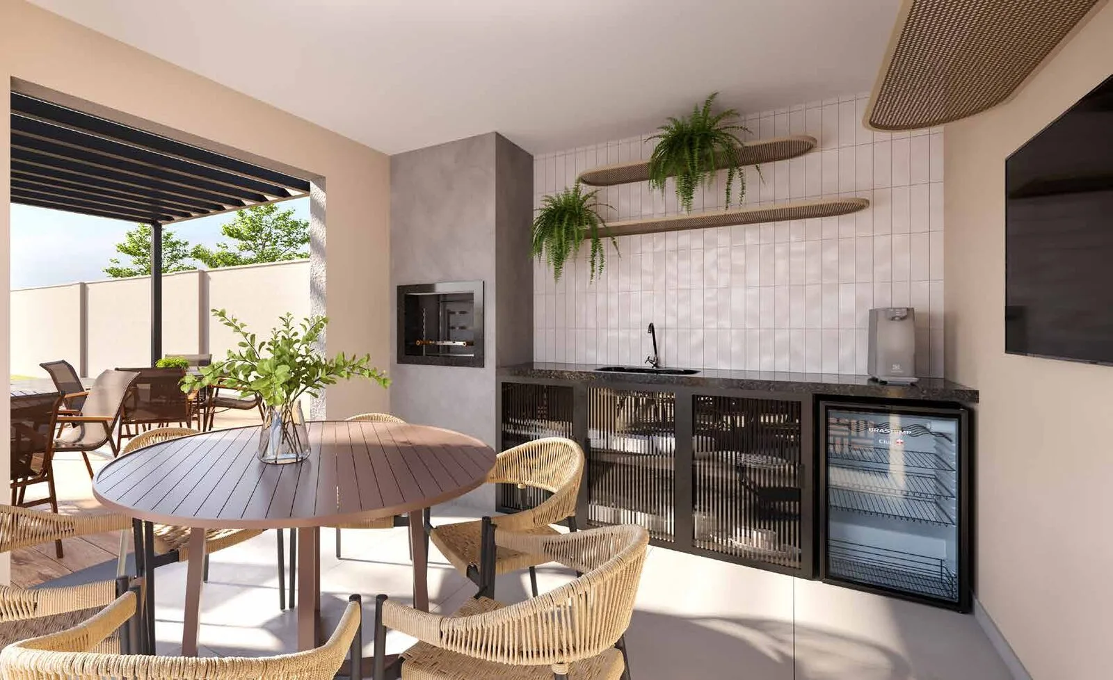 Área gourmet do Inove Residence, com mesa, churrasqueira e bancada